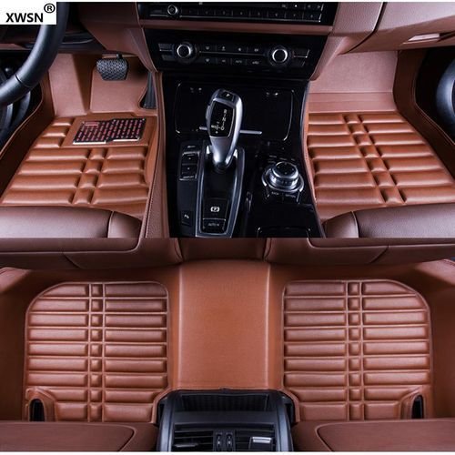 Set of custom leather car floor mats (front and rear) displayed on white background.