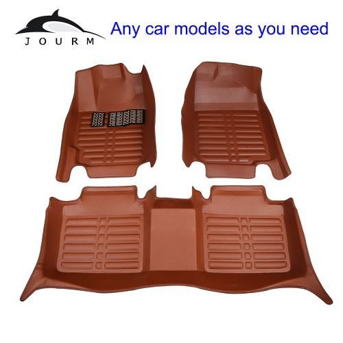Set of custom leather car floor mats (front and rear) displayed on white background.
