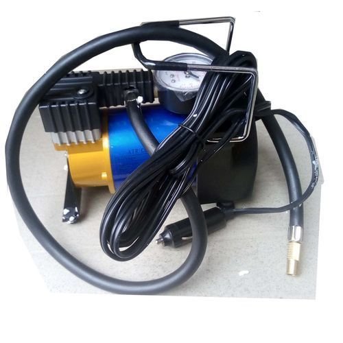 Portable mobile tire pump/air inflator for cars, buses, and trucks on white background.