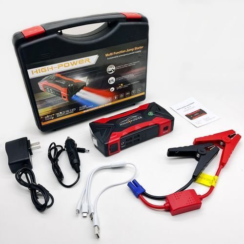 Portable car jump starter powerbank with integrated cables and LED flashlight on white background