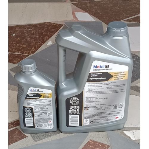 6-liter container of Mobil 1 Advanced Full Synthetic Engine Oil 5W-30 on white background
